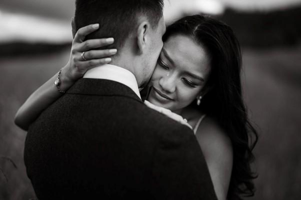 Wedding Photography - Wedding couple embracing