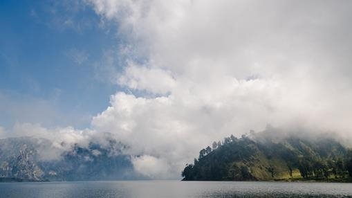 Low cloud over the crater lake of Mount Rinjani on the isle of Lombok