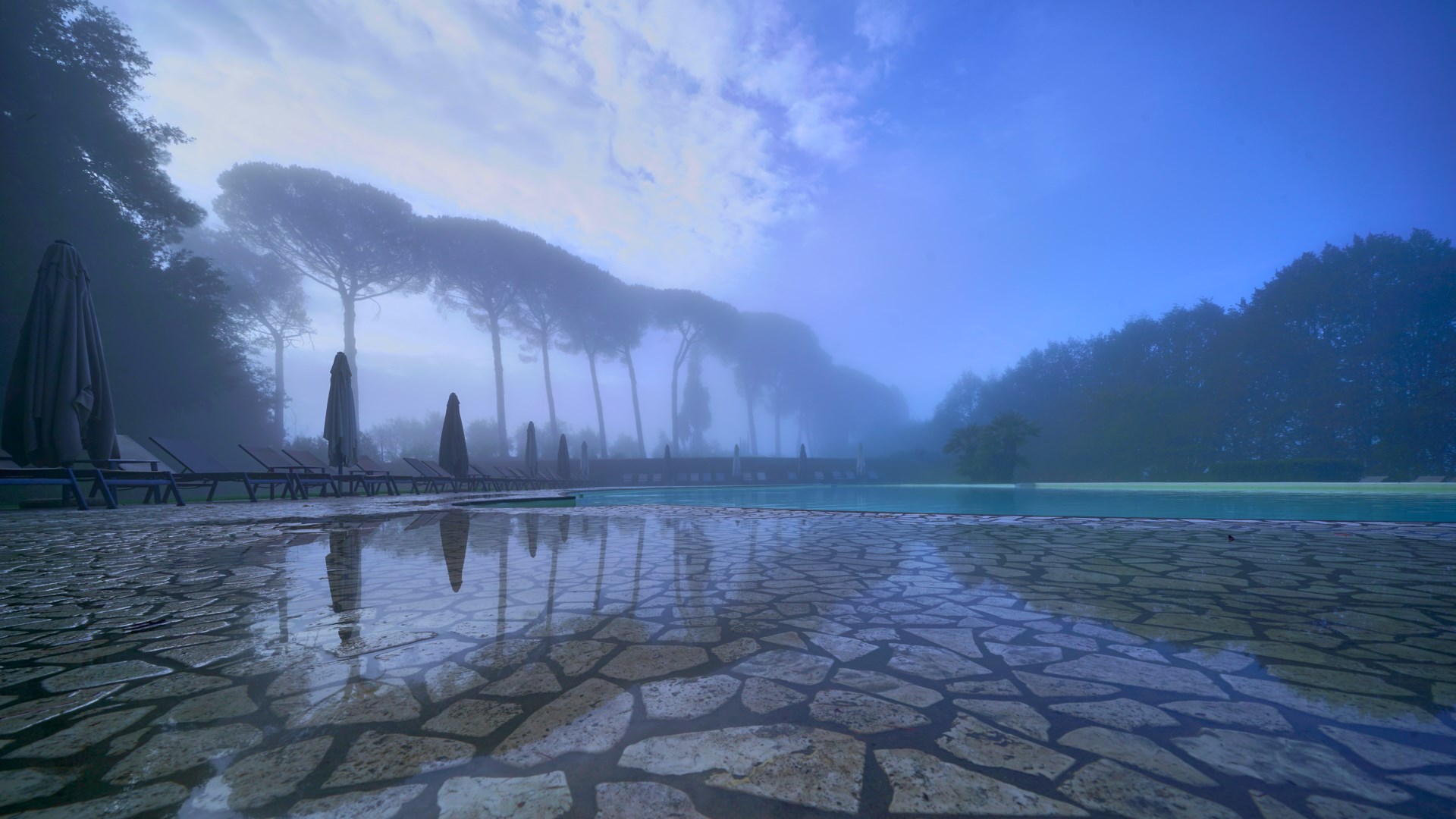 Swimming pool in Tuscany, Italy one autumn morning.