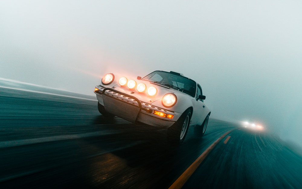 Automotive Photography - Photo of sports car driving with headlights on