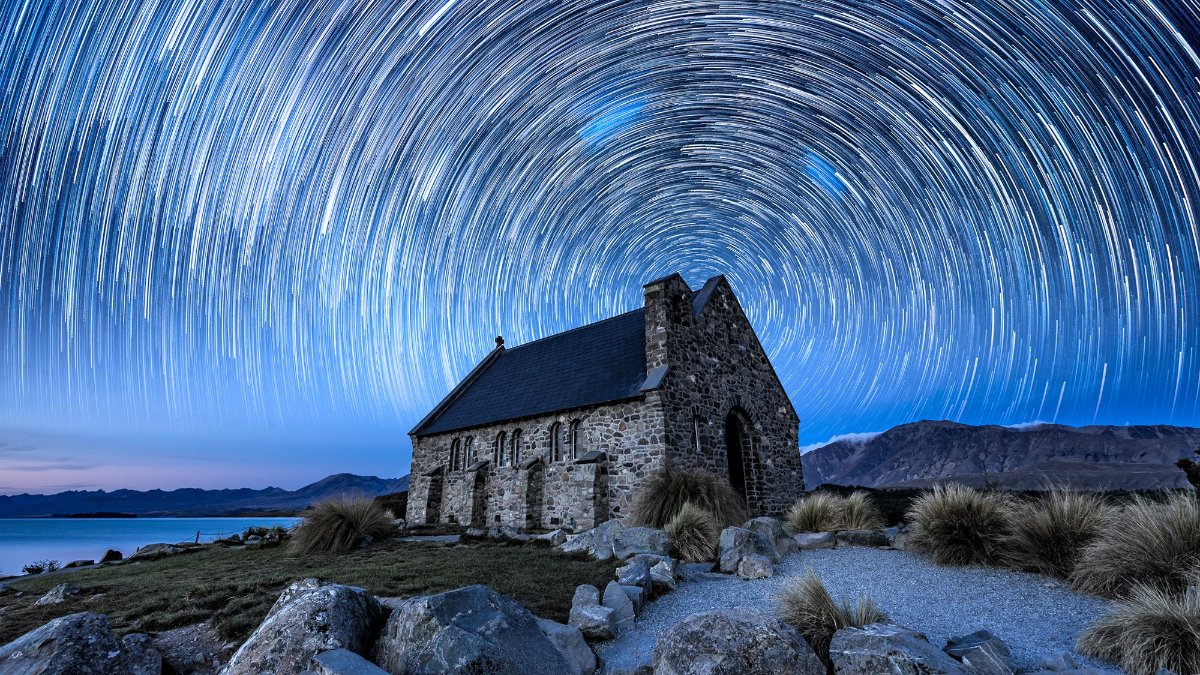 The Church of the Good Shepherd under a starry night. This is a composite image of one frame for the foreground, and 150 images for the star trails.